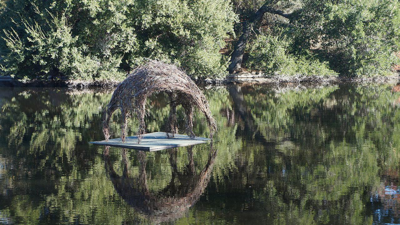 small house floating on lake